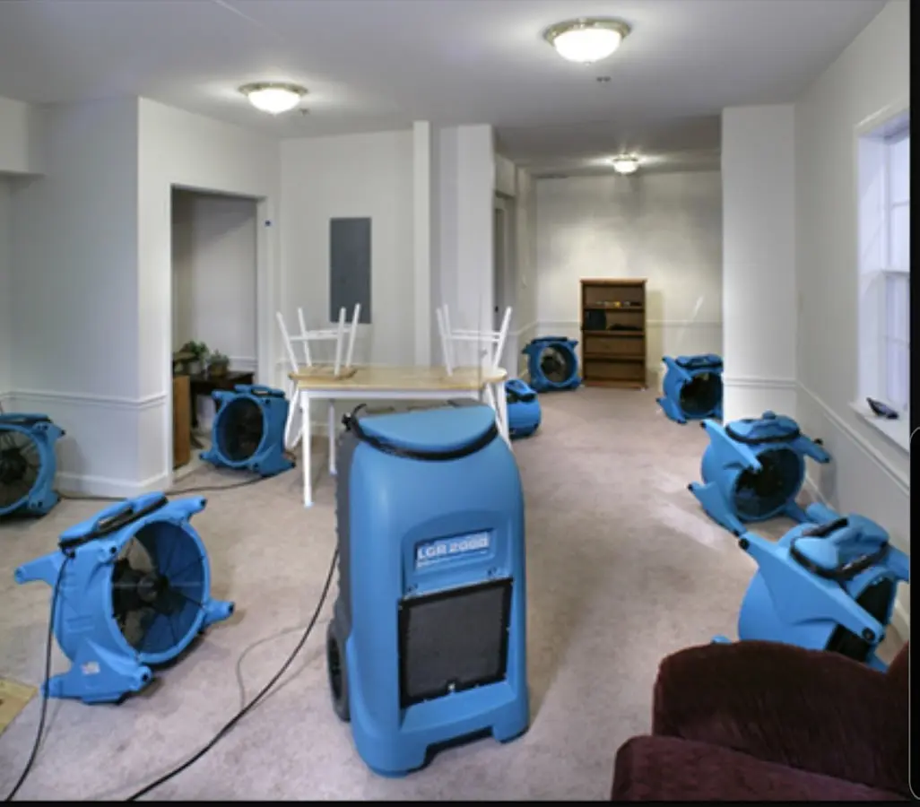 Air movers and dehumidifier setup for Water Damage Restoration in Hamlet